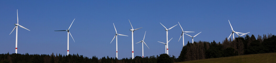 a modern wind park in dusk panorama