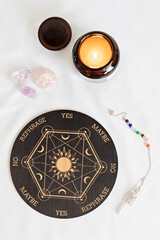 Pendulum board for divination, fortune telling or communicating with spirits. Magical crafting, witchcraft idea