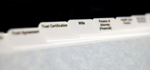 Estate Planning Documents with Tabs for Wills Power of Attorney and Trust