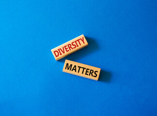 Diversity matters symbol. Wooden blocks with words Diversity matters. Beautiful blue background. Business and Diversity matters concept. Copy space.