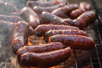 Grilled sausages on the grill, soft focus