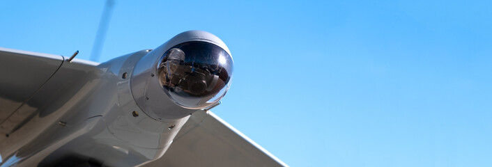 Camera in the head of an unmanned military drone close-up, modern military equipment