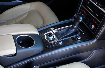 Plakat Automatic gearbox shift lever premium car. Close up of the automatic transmission shift lever with luxury.