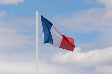 flag of France against cloudy sky