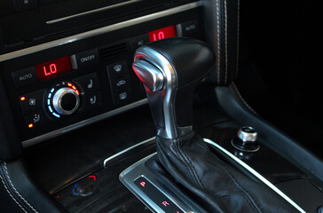 Automatic gearbox shift lever premium car. Close up of the automatic transmission shift lever with luxury.