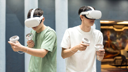 A team of friends playing with VR equipment