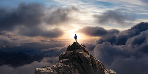 Adventurous Man Standing on top of Mountain Cliff. Exteme Adventure Composite - obrazy, fototapety, plakaty