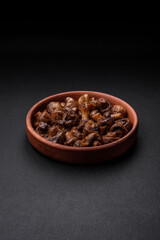 Delicious champignon mushrooms with salt, spices and herbs