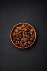 Delicious champignon mushrooms with salt, spices and herbs