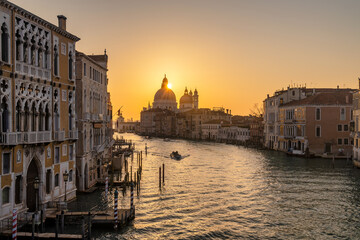 Plakat The Grand Canal in Venice with the silhouette of the Santa Maria della Salute basilica at sunrise, Italy, Europe.