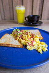 Fototapeta na wymiar breakfast with scrambled eggs