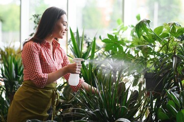 Portrait of female florist in her flower shop.