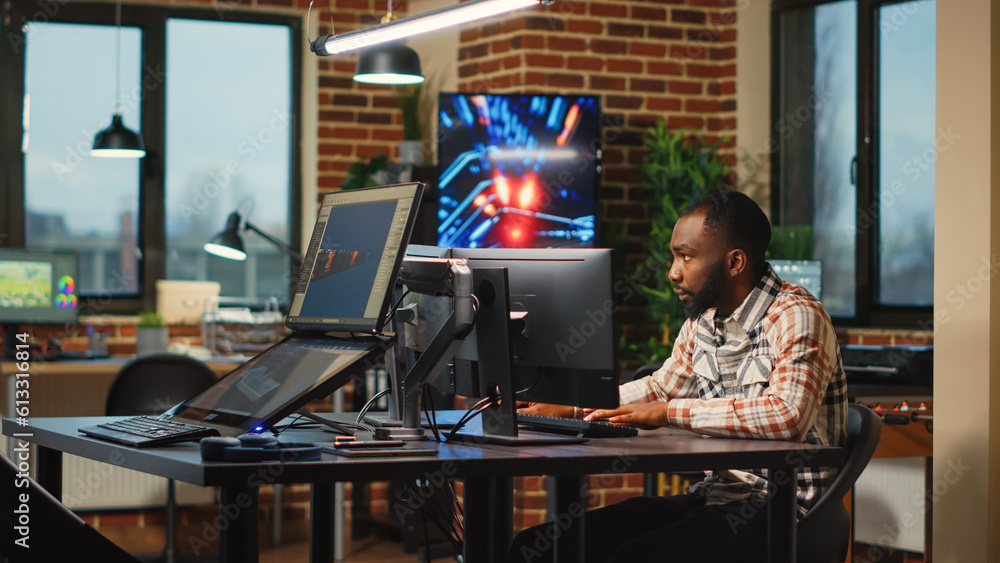 Wall mural african american web developer working in artistic office to create cgi content on 3d software, digi