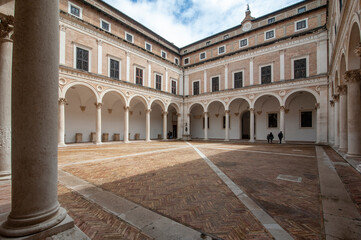 Fototapeta na wymiar Urbino, Italy - 2023, May 5: The arcaded courtyard of Palazzo Ducale