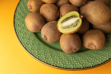 fresh kiwi on plate tropical fruit
