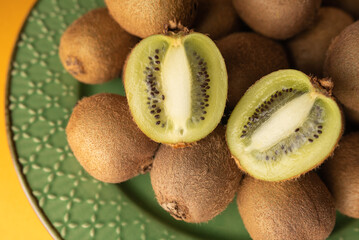 fresh kiwi on plate tropical fruit
