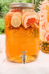 lemonade cocktail cool drink from orange and grapefruit in a glass jar