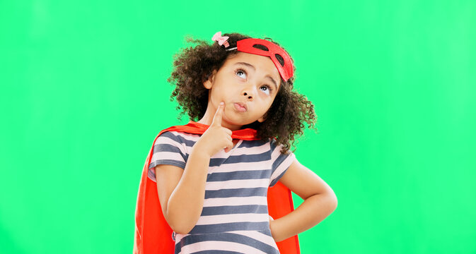 Child, superhero and thinking on green screen to stop crime and fight with fantasy or cosplay costume. Girl power, hero and pretend game with strong kid portrait to protect freedom idea for justice