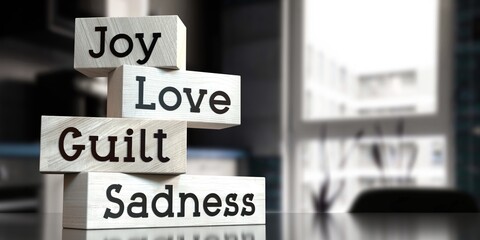 Joy, love, guilt, sadness - words on wooden blocks - 3D illustration
