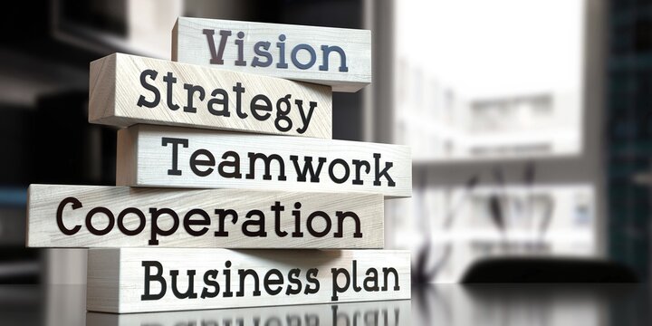 Vision, strategy, teamwork, cooperation, business plan - words on wooden blocks - 3D illustration