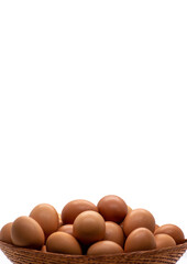 fresh brown eggs for sale in a market. organic product. isolated on white background. selective focus. closeup