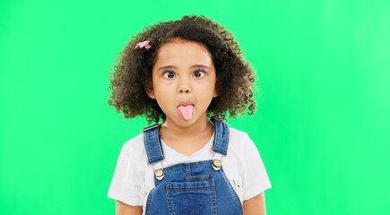 Little girl, silly and goofy face on green screen with facial expressions against a studio...