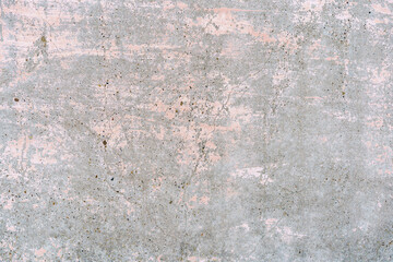 Gray textured concrete wall with a rough pattern.