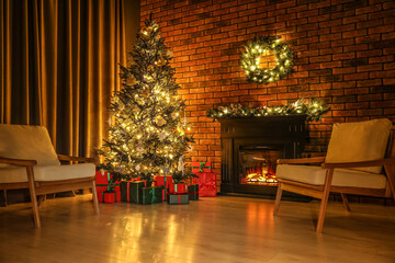 Beautifully wrapped gift boxes under Christmas tree in living room