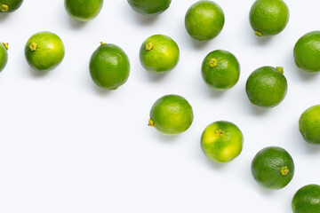 Fresh limes isolated on white background.