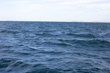 Blue sea water surface texture. Blue ocean summer