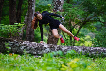 Selective focus Asian woman exercising, running, trail running in the midst of nature.