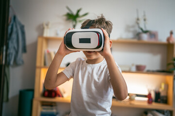 boy male caucasian child at home enjoy virtual reality VR headset