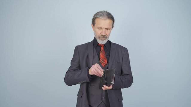 Moneyless businessman. Empty wallet.