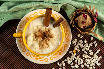 cup of canjica, typical food consumed in the Brazilian Festa Juninas
