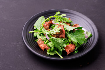 Beef salad with green vegetables Grilled beef salad Thai food Healthy beef salad menu with pepper, garlic, spices Lunch Dinner