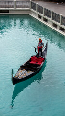 Fototapeta na wymiar Empty gondola with standing driver