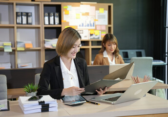 Asian business woman Working at the office