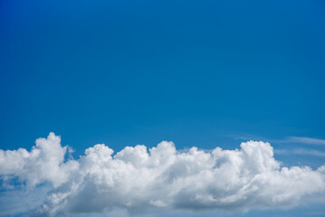 Blue sky and white clouds The freshness of a new day Bright blue background Feel relaxed like in the sky Landscape image of blue sky and thin clouds