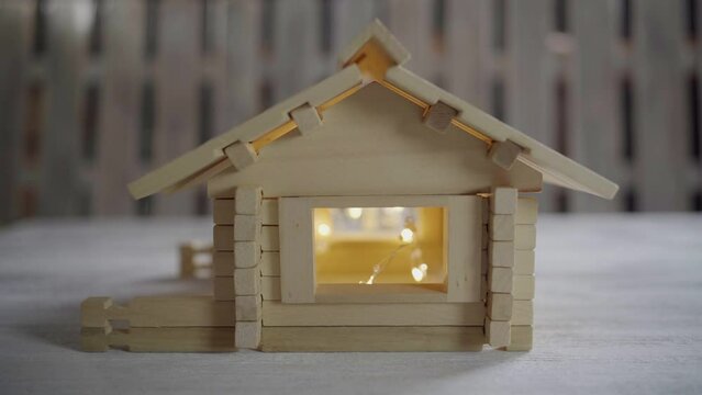 wooden toy house on the table