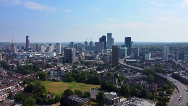 Drone shot Croydon city skyline in South London on hot summer day