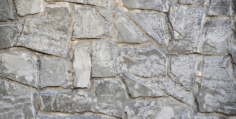 Pattern gray color of modern style design decorative uneven cracked real stone wall surface