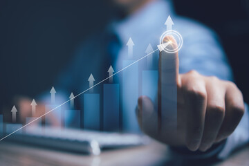 Businessman planning business success strategy target stock market graph