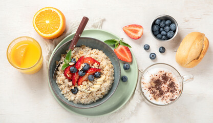 Healthy homemade oatmeal with berries for breakfast.