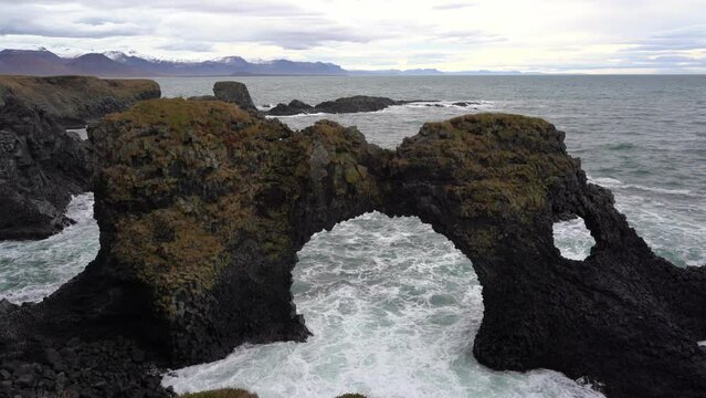 Gatklettur arch shaped rock at coast of Snaefellsnes peninsula in Iceland