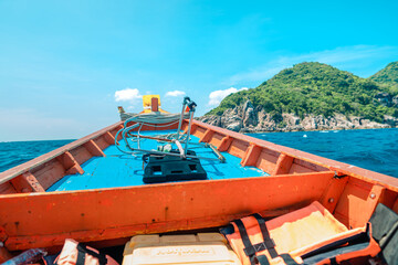 Fototapeta na wymiar traveling on a long-tail boat on the bay at Koh Tao