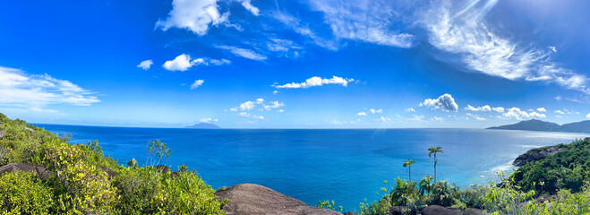 Panoramic view of Anse major nature trail, mountain view, lush national park with granite rocks, Mahe Seychelles
