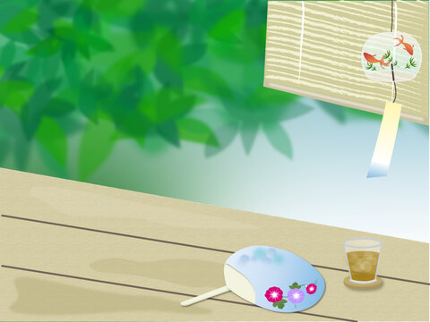 縁側に置かれた麦茶とうちわの風景