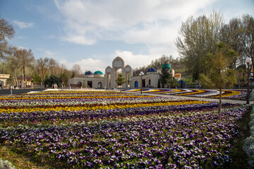 different color flowers in a historical place