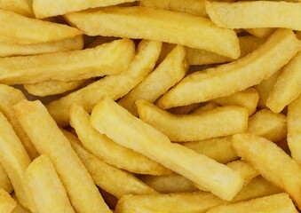 Belgian golden yellow fries. Background.