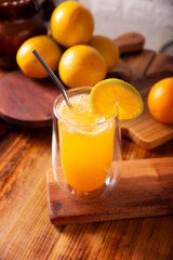 Refreshing homemade orangeade, a natural hydrating drink made from orange juice, very popular in several countries, ideal to drink in hot summers.